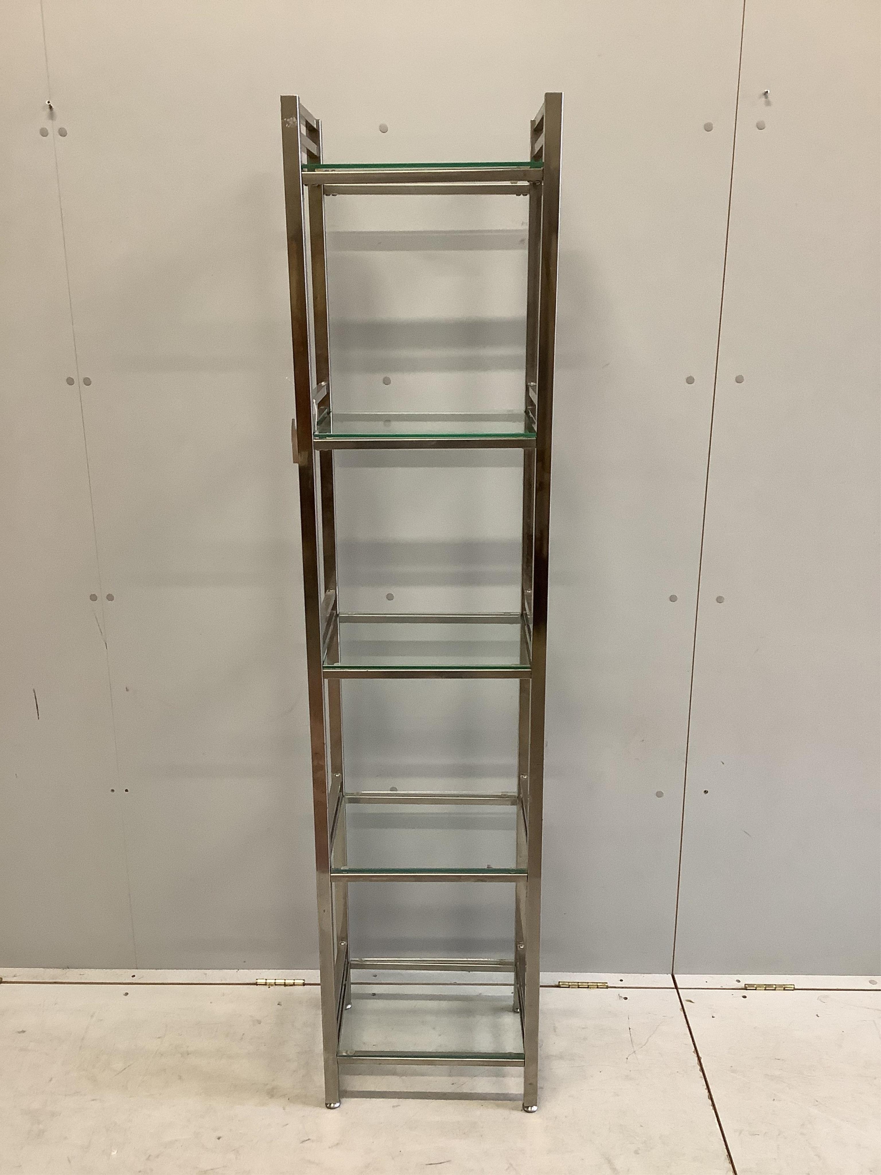 A chrome and glass five tier display unit, width 40cm, depth 30cm, height 176cm. Condition - fair